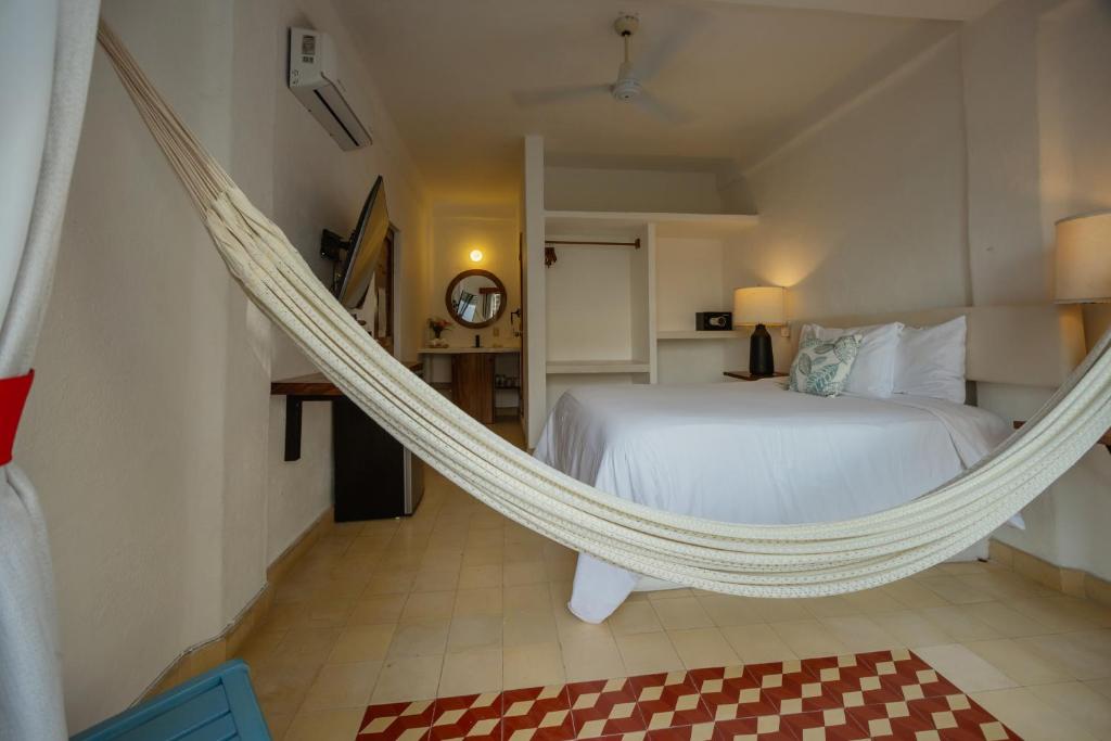 Postel nebo postele na pokoji v ubytování Hotel Amaca Puerto Vallarta - Adults Only