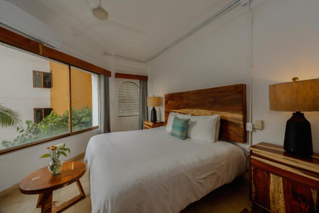 Postel nebo postele na pokoji v ubytování Hotel Amaca Puerto Vallarta - Adults Only