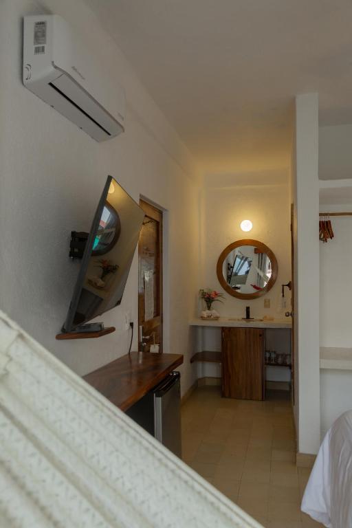 Postel nebo postele na pokoji v ubytování Hotel Amaca Puerto Vallarta - Adults Only