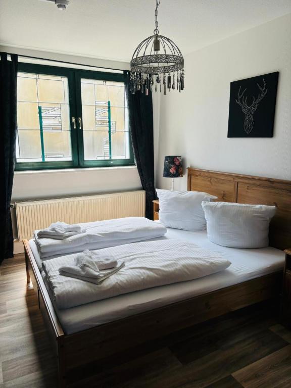 Postel nebo postele na pokoji v ubytování Themenhotel Rehlein