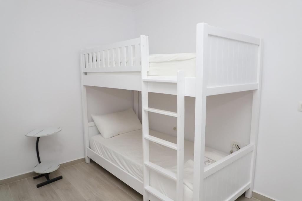 Postel nebo postele na pokoji v ubytování Aral Hostel