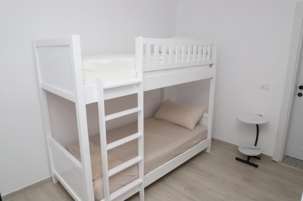 Postel nebo postele na pokoji v ubytování Aral Hostel