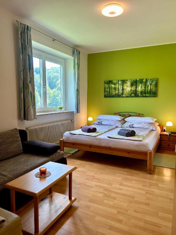 Postel nebo postele na pokoji v ubytování Haus Steinfeld