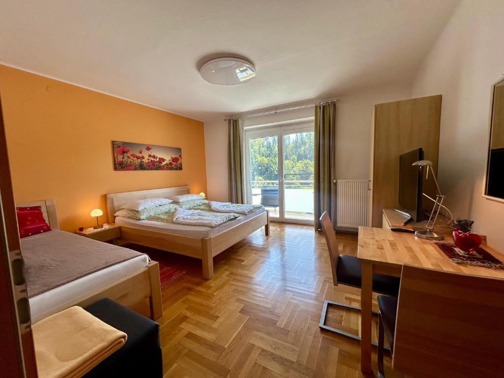 Postel nebo postele na pokoji v ubytování Haus Steinfeld