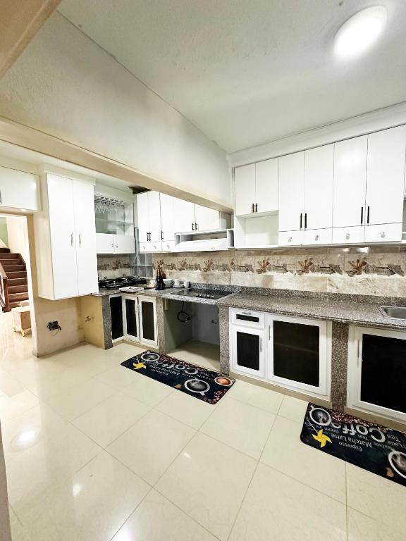 Kuchyň nebo kuchyňský kout v ubytování PL Residencia