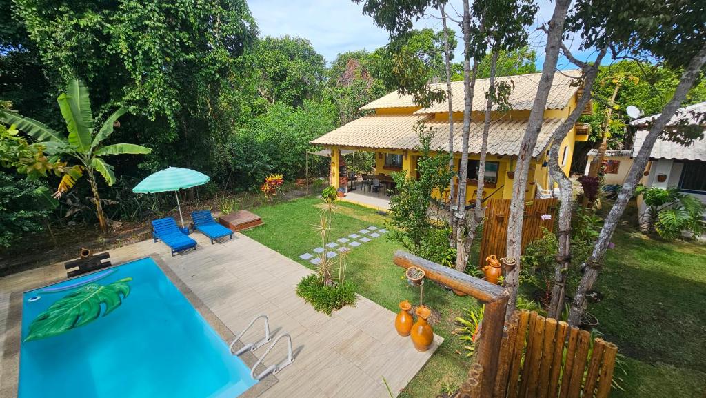 Bazén v ubytování Vila Axé Casa Amarela Guaratiba nebo v jeho okolí
