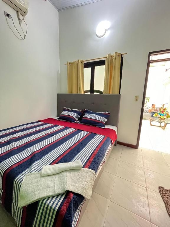 Postel nebo postele na pokoji v ubytování Casa del profe
