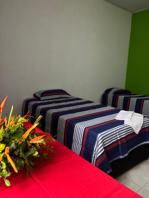 Postel nebo postele na pokoji v ubytování Casa del profe