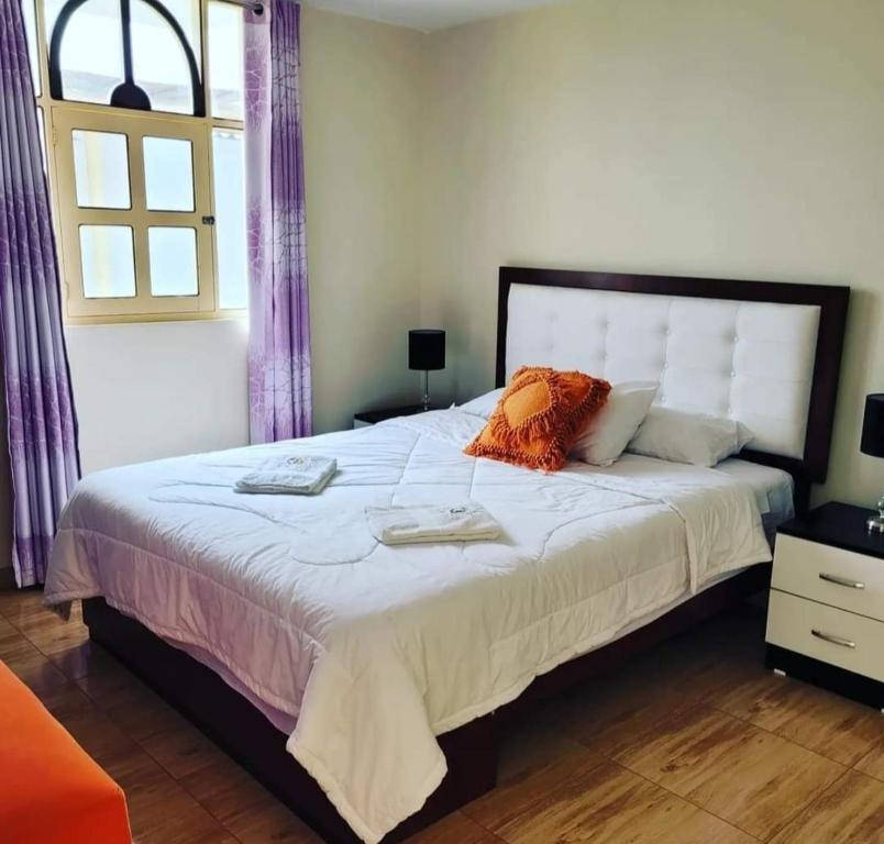 En eller flere senge i et værelse på HOTEL MAR Y SOL Playa el Milagro