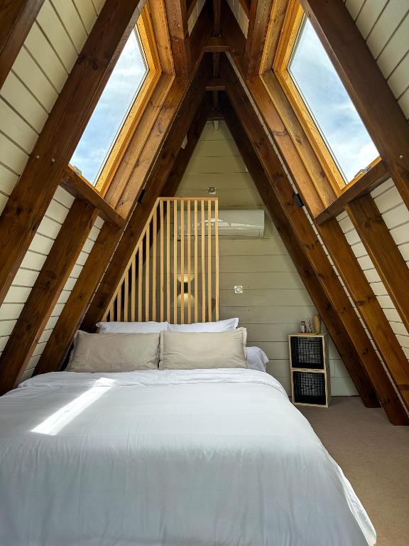 Postel nebo postele na pokoji v ubytování Mini Villa ATIKA Luxe Tropical pour Deux