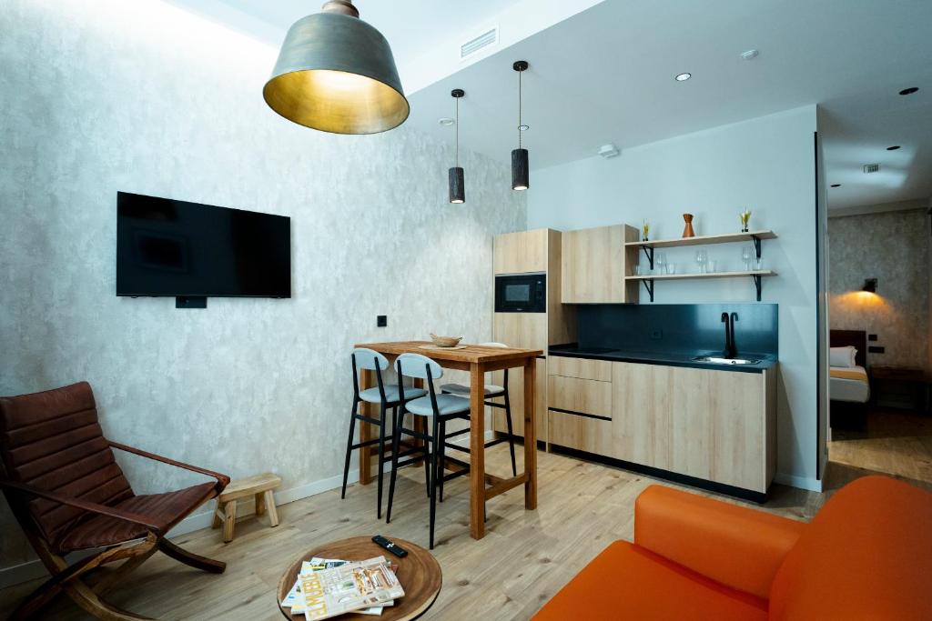 Kuchyň nebo kuchyňský kout v ubytování Aparthotel Luz de Gades - Suites Spa Gym - Adults Only