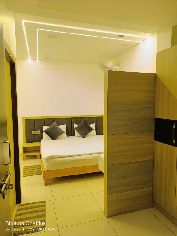 Postel nebo postele na pokoji v ubytování Good Vibes Hotel