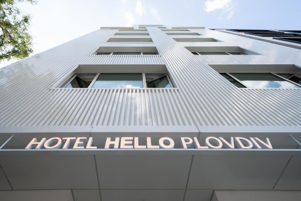 a building with a hotel hello plondon sign on it at Hotel Hello Plovdiv - Free Parking and Pet Friendly in Plovdiv