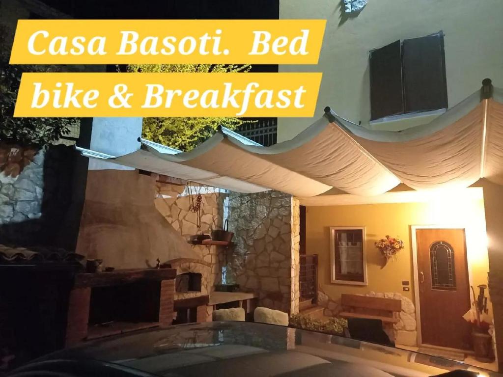 a sign that reads casa brazil bed bike and breakfast at B&B Casabasoti in Valli del Pasubio