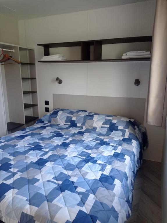 Letto o letti in una camera di AgriCamping Ca' Bodi