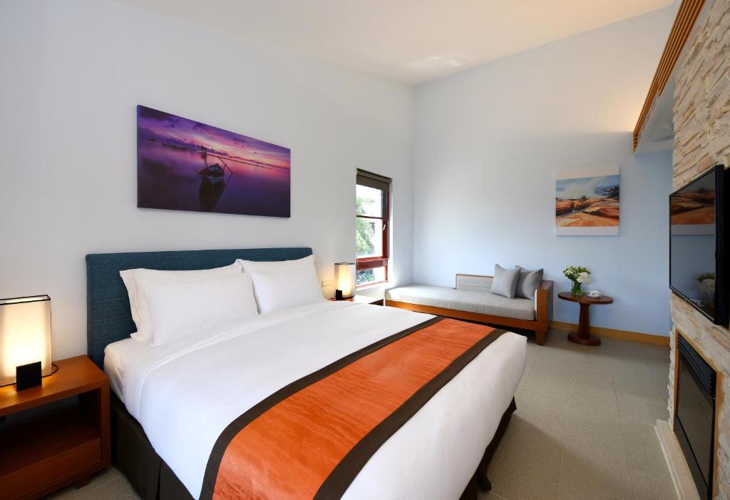 Postel nebo postele na pokoji v ubytování Fullon Hotel Fulong