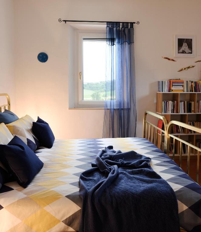 Postel nebo postele na pokoji v ubytování B&B Il Bed and Bookfast