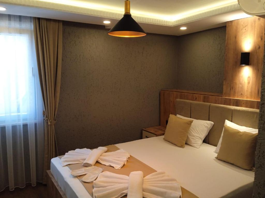 Postel nebo postele na pokoji v ubytování Yellow Bull Istanbul hotel