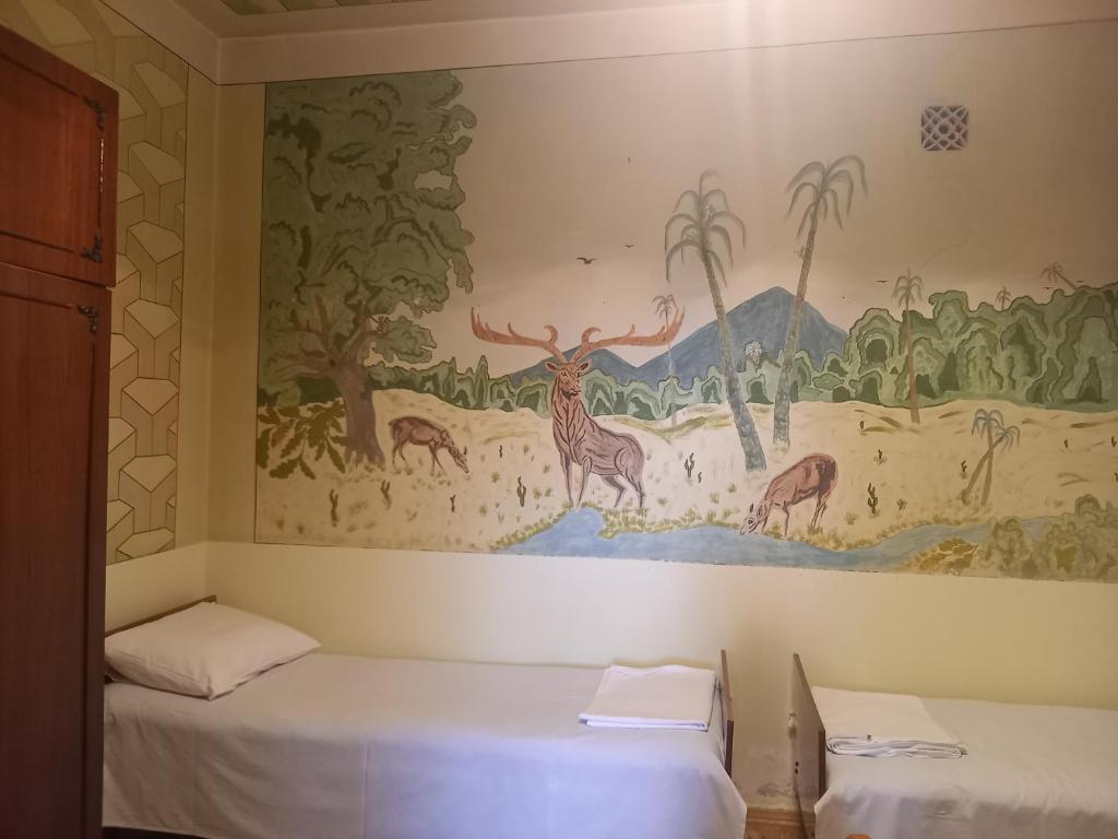 Postel nebo postele na pokoji v ubytování SELINA GUEST HOUSE