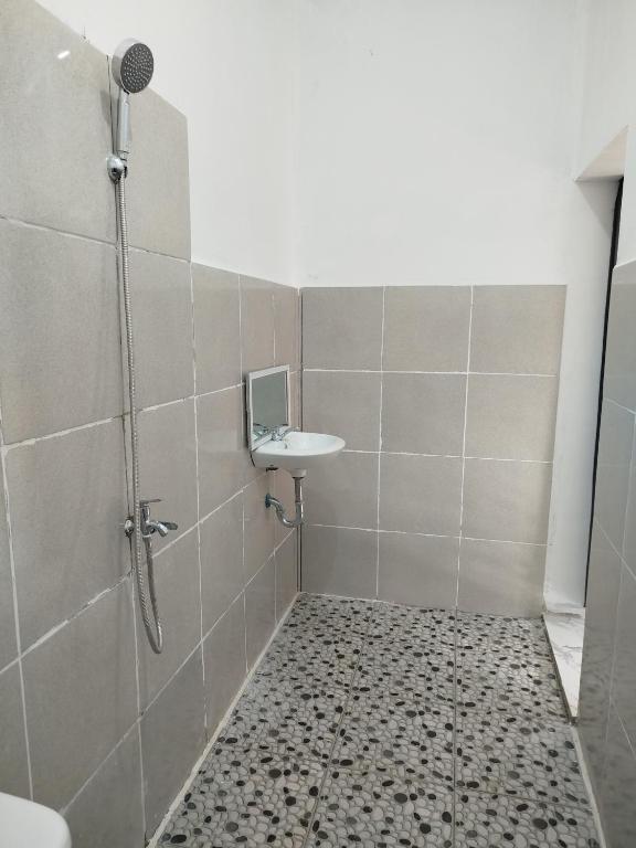 Koupelna v ubytování Marsha Homestay