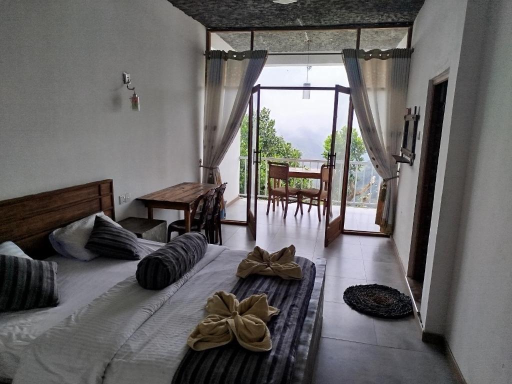 Postel nebo postele na pokoji v ubytování Rock Paradise Homestay