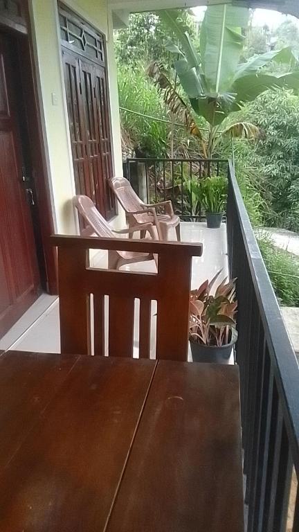 Balkón nebo terasa v ubytování Sadew Home Stay