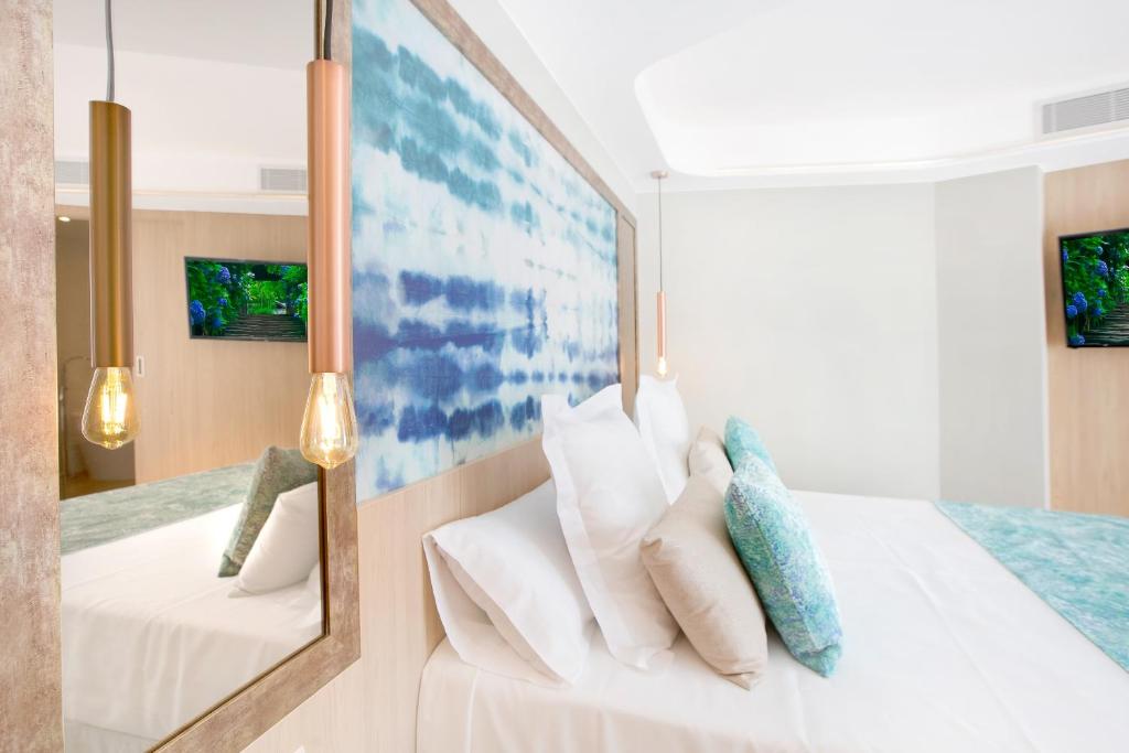 Posteľ alebo postele v izbe v ubytovaní Sumus Hotel Stella and Spa 4S Adults Recommended