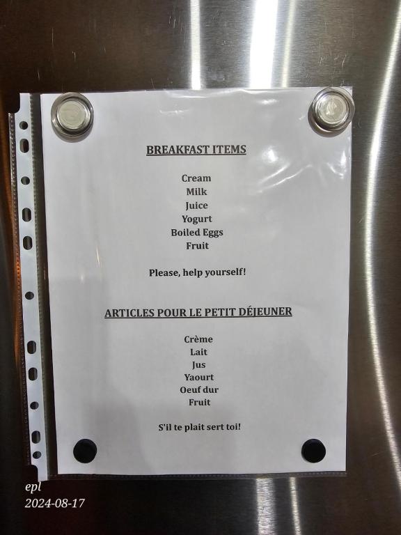 a sign with a list of different items on at Small Town Bound Inn in Montague