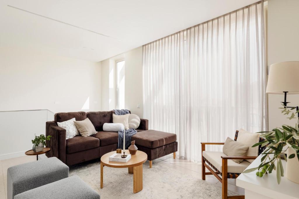 Posezení v ubytování The J Luxury Apartments - By Localz Group