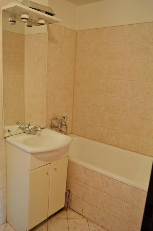 Koupelna v ubytování Apartment Trojska