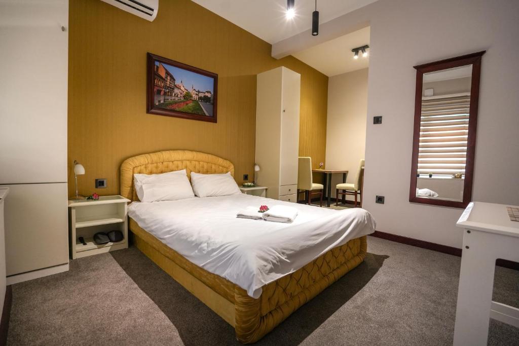 Postel nebo postele na pokoji v ubytování Apartmani Element