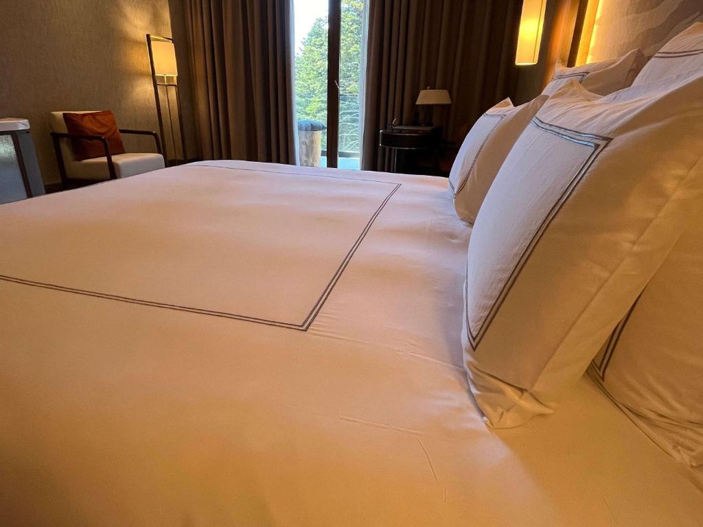 Postel nebo postele na pokoji v ubytování Swissotel Uludag Bursa