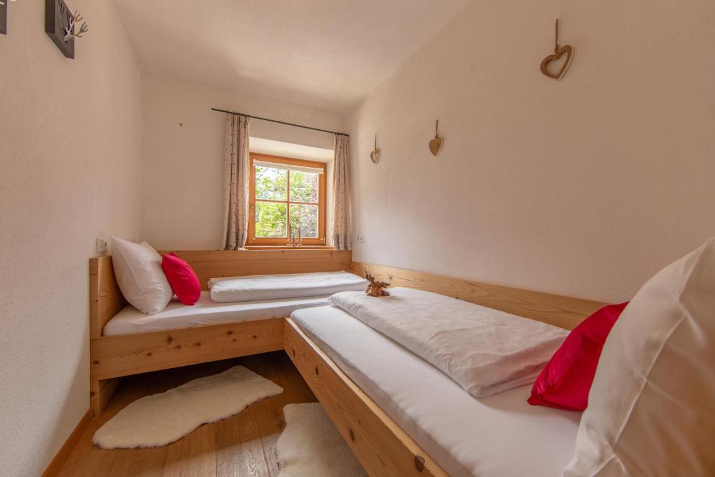 Łóżko lub łóżka w pokoju w obiekcie Residence Tamperhof