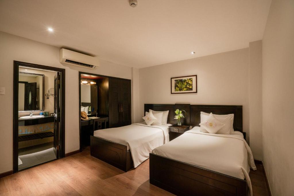 Phòng Deluxe 2 Giường đơn - Không có Cửa sổ