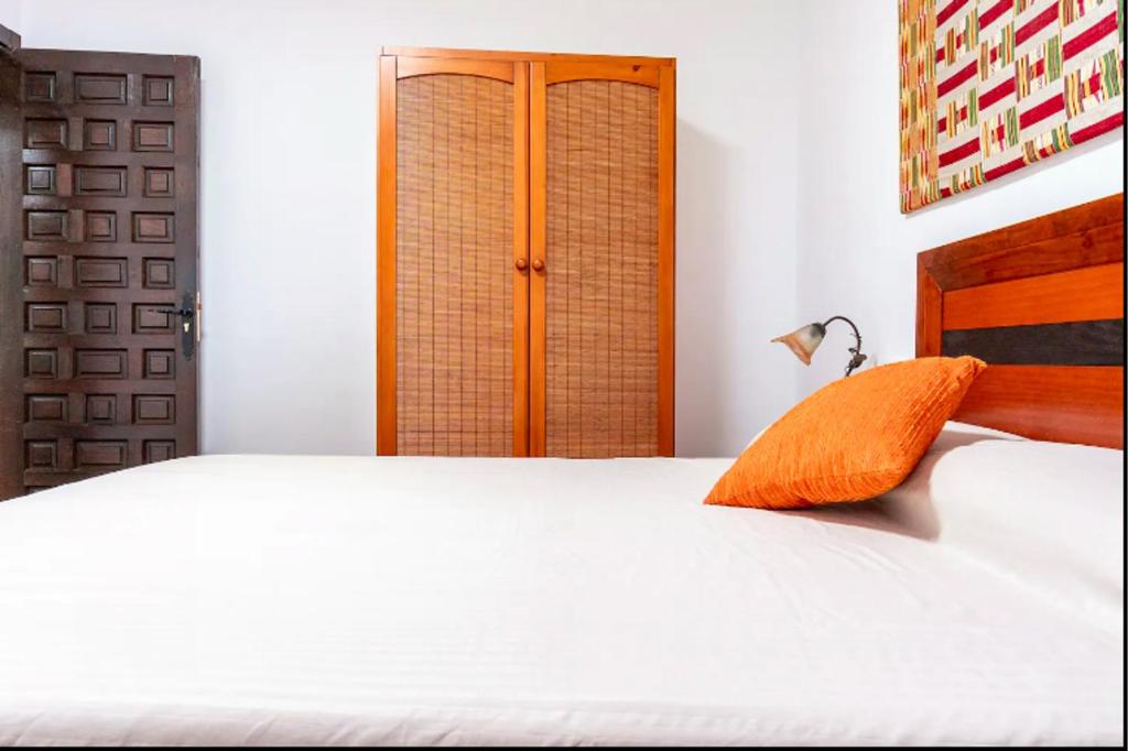 Postel nebo postele na pokoji v ubytování Casa del Ermitaño