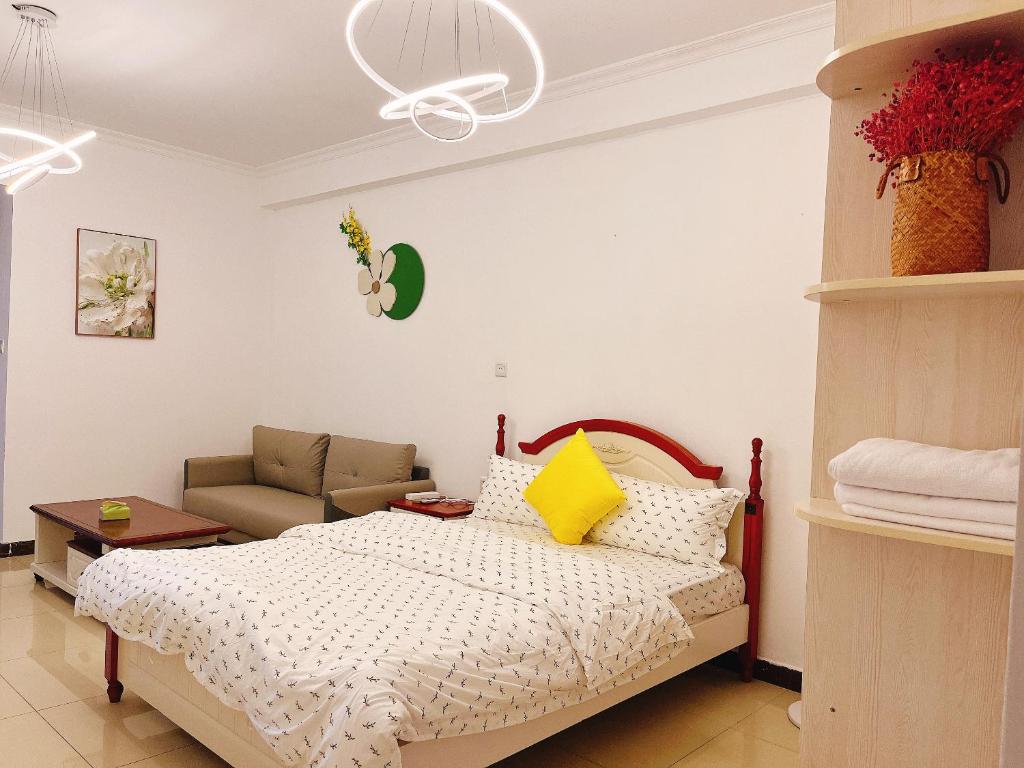 Postel nebo postele na pokoji v ubytování Lan House Youth Apartment