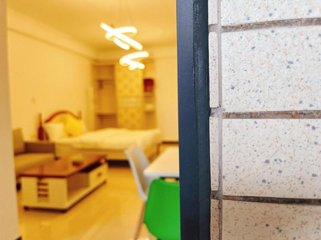 Postel nebo postele na pokoji v ubytování Lan House Youth Apartment