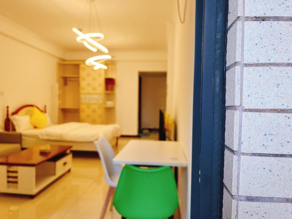 Postel nebo postele na pokoji v ubytování Lan House Youth Apartment