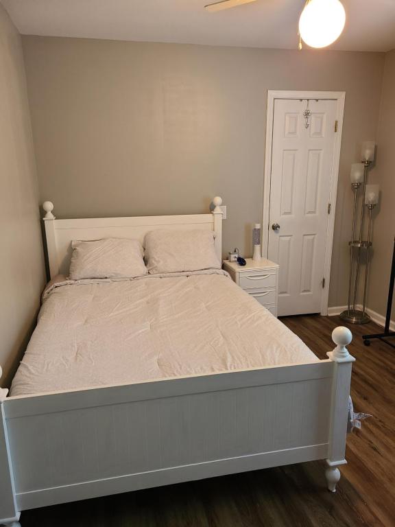 Ένα ή περισσότερα κρεβάτια σε δωμάτιο στο Staycation Oasis