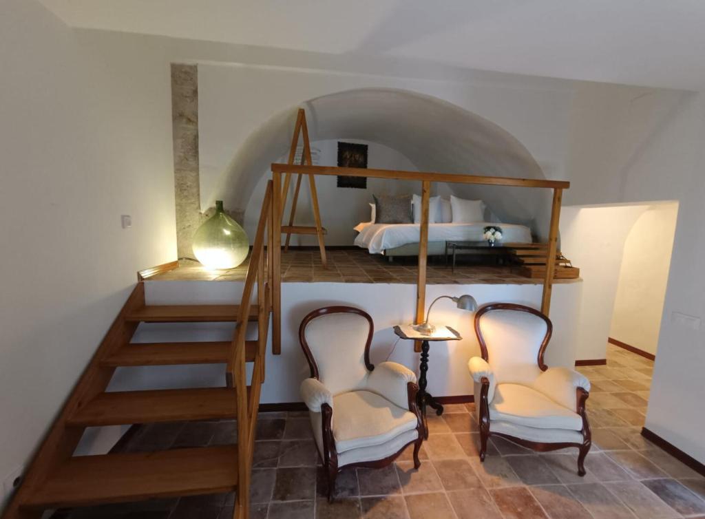 Postel nebo postele na pokoji v ubytování Casona Alcarria
