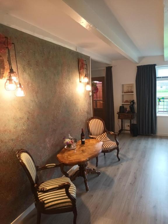 Posezení v ubytování B&B it Arbeidershûske