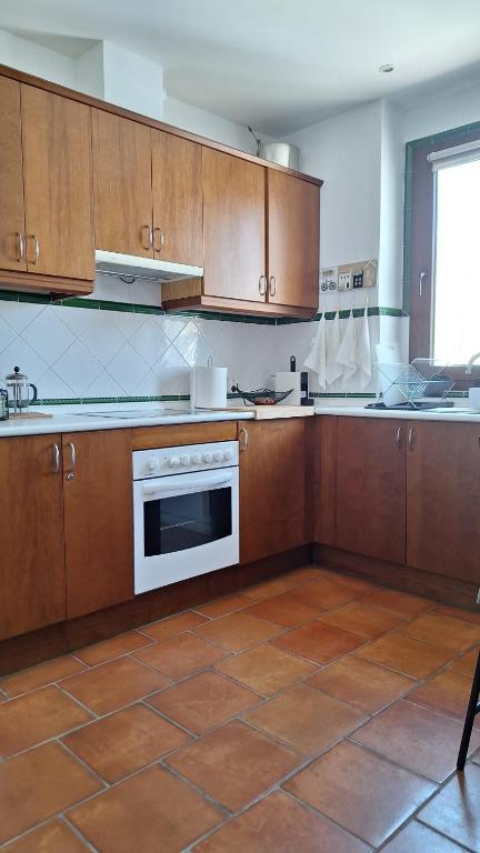Kuchyň nebo kuchyňský kout v ubytování CASA DE FLORES