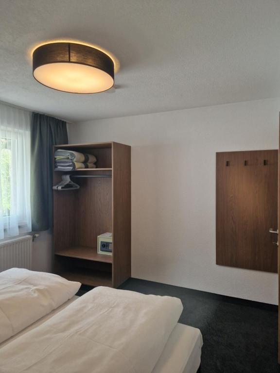 Postel nebo postele na pokoji v ubytování Haus Talblick