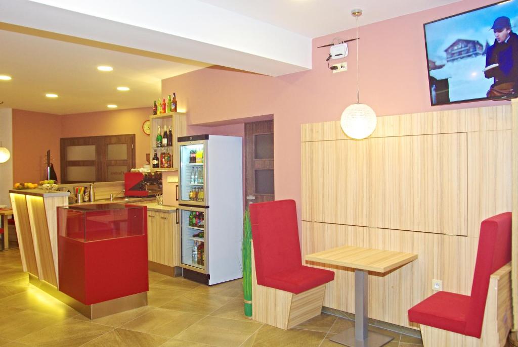 Kuchyň nebo kuchyňský kout v ubytování Hotel Pod Radnicí