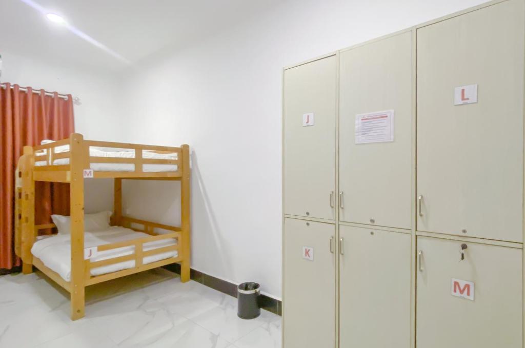 Postel nebo postele na pokoji v ubytování Easy Backpackers Paradise