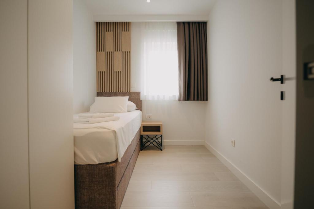 Posteľ alebo postele v izbe v ubytovaní Malo More Resort