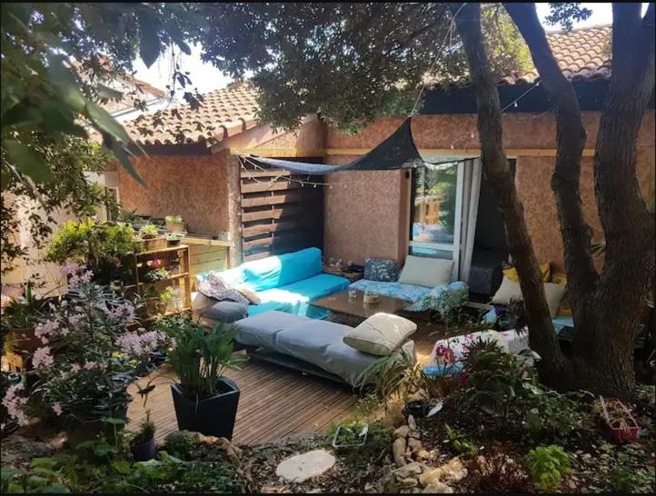 Zahrada ubytování Petite Villa 4-6 personnes belles terrasses, piscine, plages