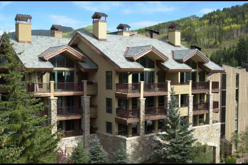 a large apartment building with a roof at Vail Antlers 2 Bedroom Condo in Vail