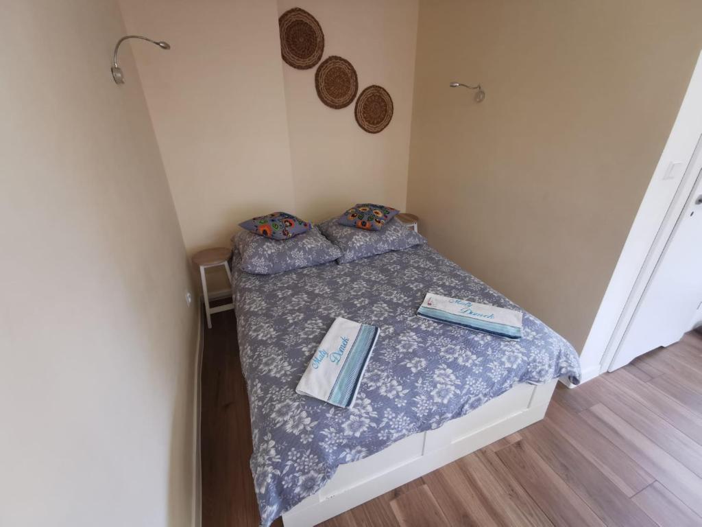 Postel nebo postele na pokoji v ubytování Maly domek