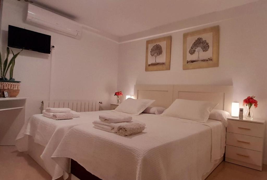 A bed or beds in a room at Armonía y Tranquilidad 3